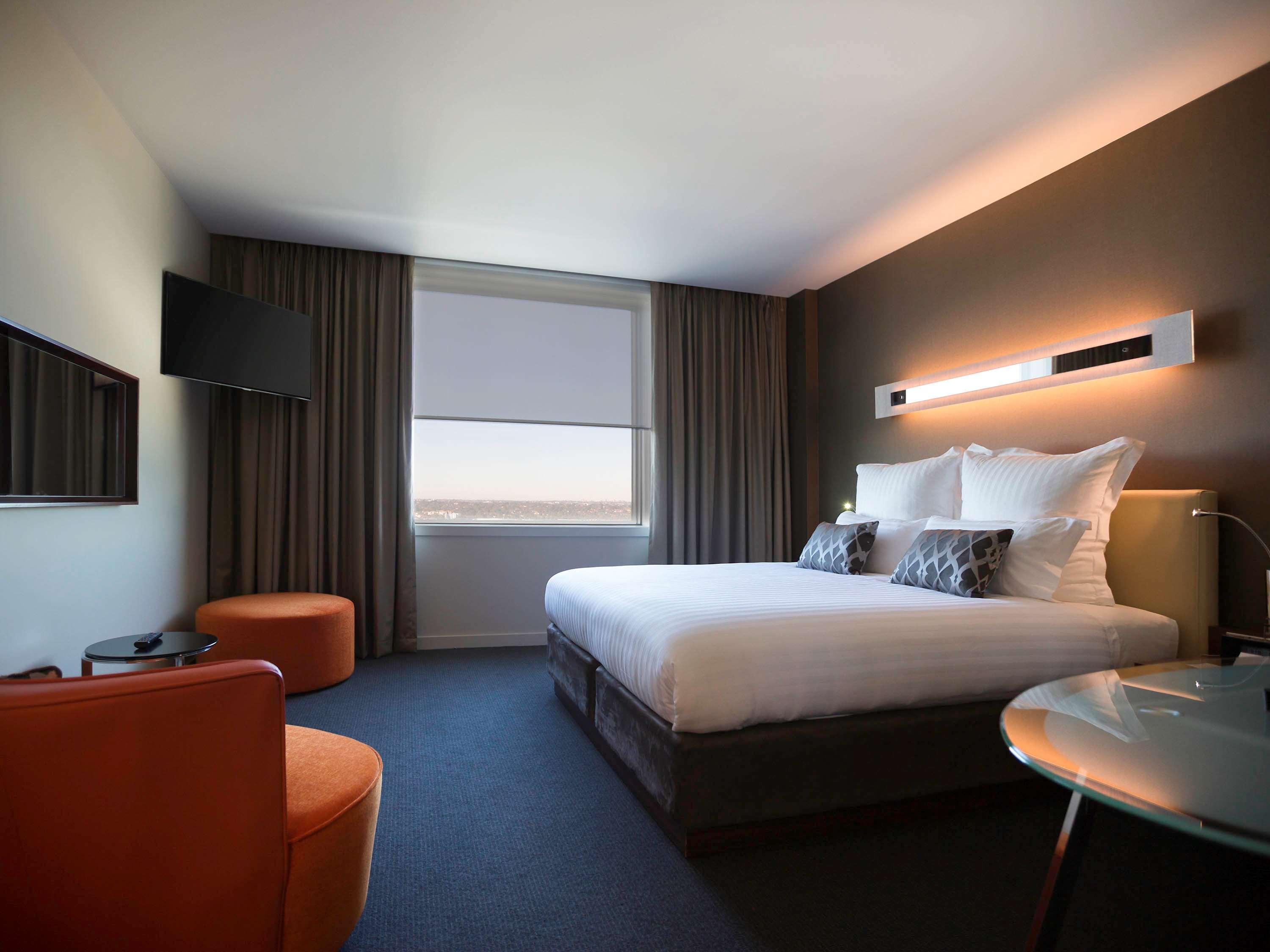 Отель Pullman Sydney Olympic Park Экстерьер фото A room at the hotel
