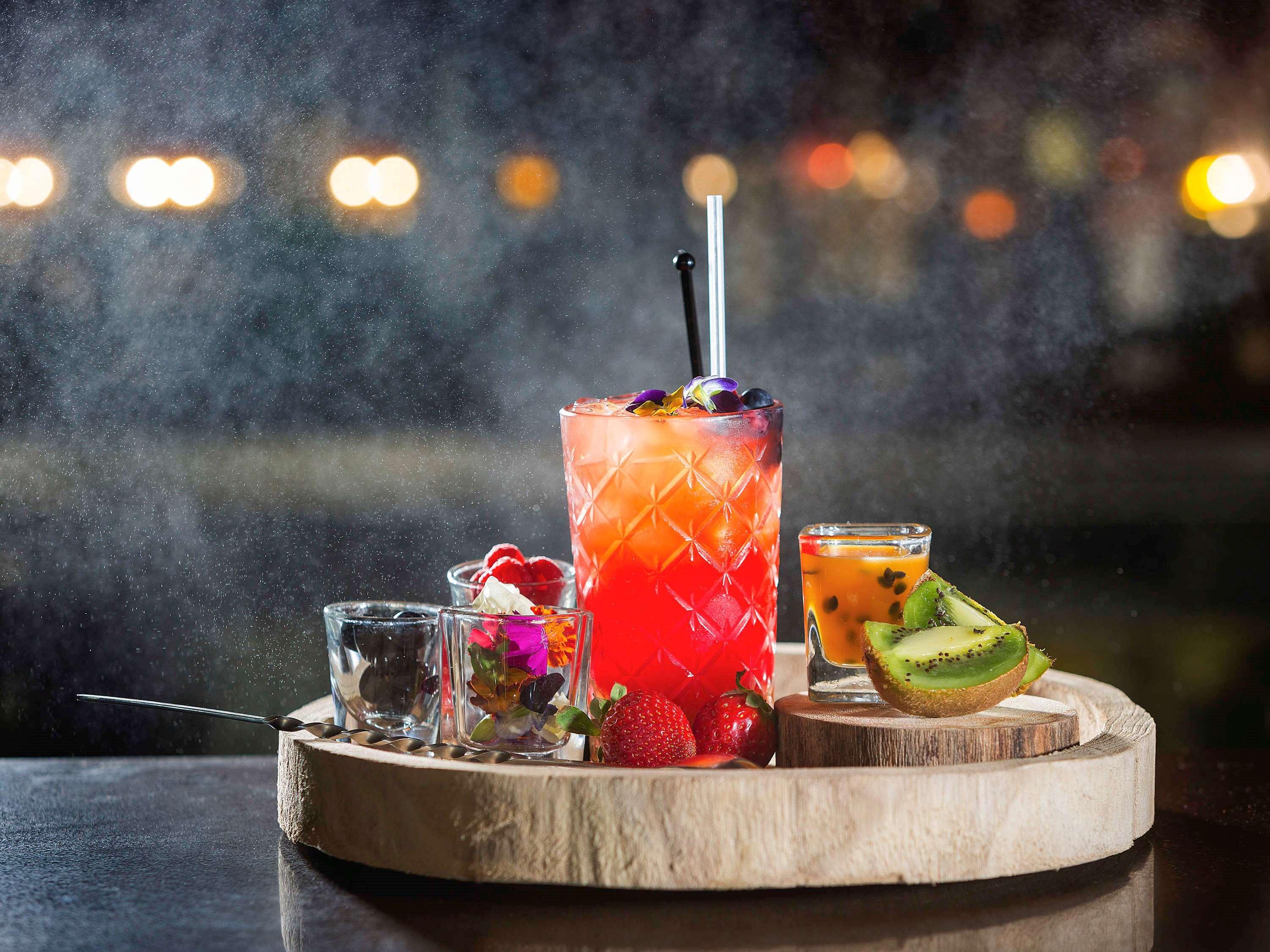 Отель Pullman Sydney Olympic Park Экстерьер фото A selection of cocktails at the bar